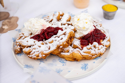 Funnel Cake in front of the Santa Monica Pier Ferris wheel